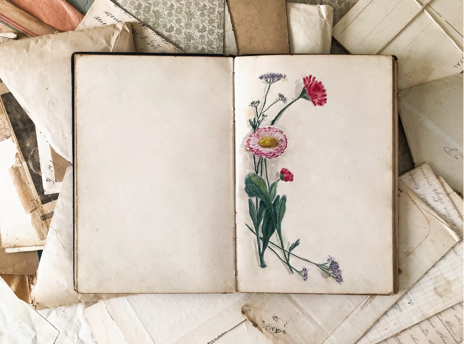 Vintage journal with hand-drawn flower