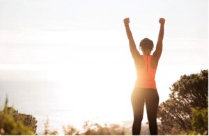 Woman reaching goals